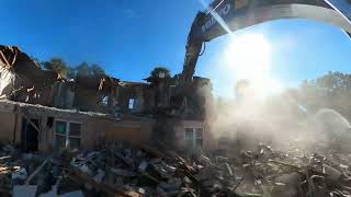 Smells Like Concrete. Looks Like A Professional Demolition Expert At Work.