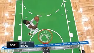 Jaylen Brown with a double pump reverse dunk