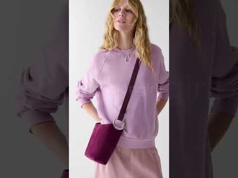 حقيبة كيت سبيد الصغيرة المرصعة بالمسامير نيويورك