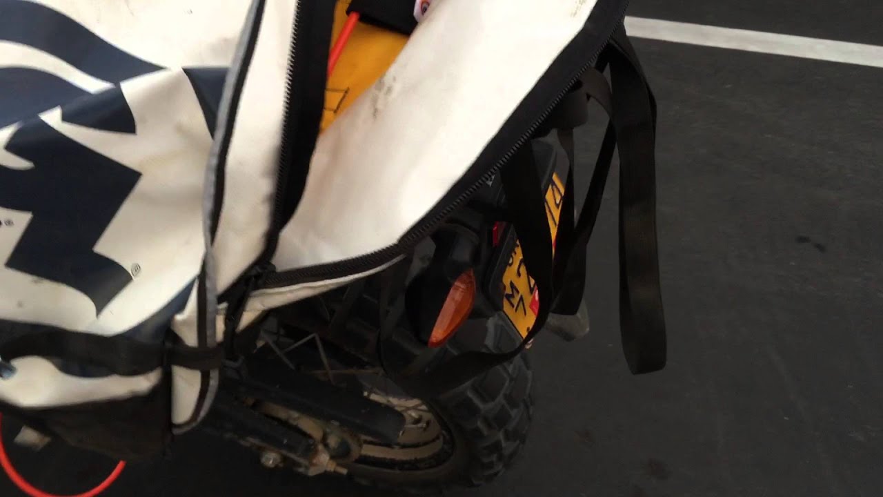 How to secure motorcycle soft luggage to bike with Giant Loop's QuickLoop cable YouTube