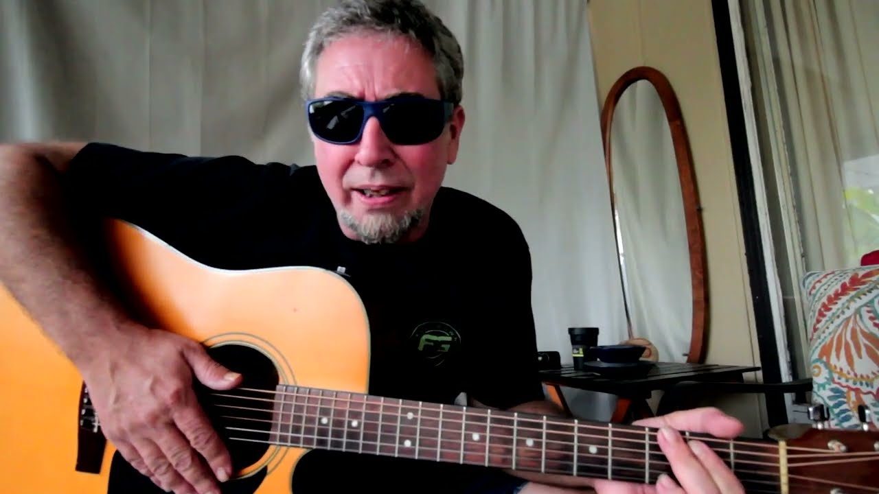 how to lower the action on an acoustic guitar