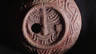 A rare 1,700 year old oil lamp, decorated with Temple symbols