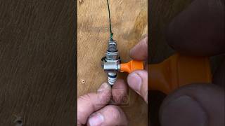 Learn how to reuse your old car spark plug in a creative way before #FloridaDIY #DIYHack #HandyTrick