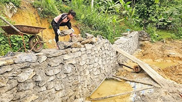 he art and technique of building natural stone embankments by a girl./ Ban Thi Diet