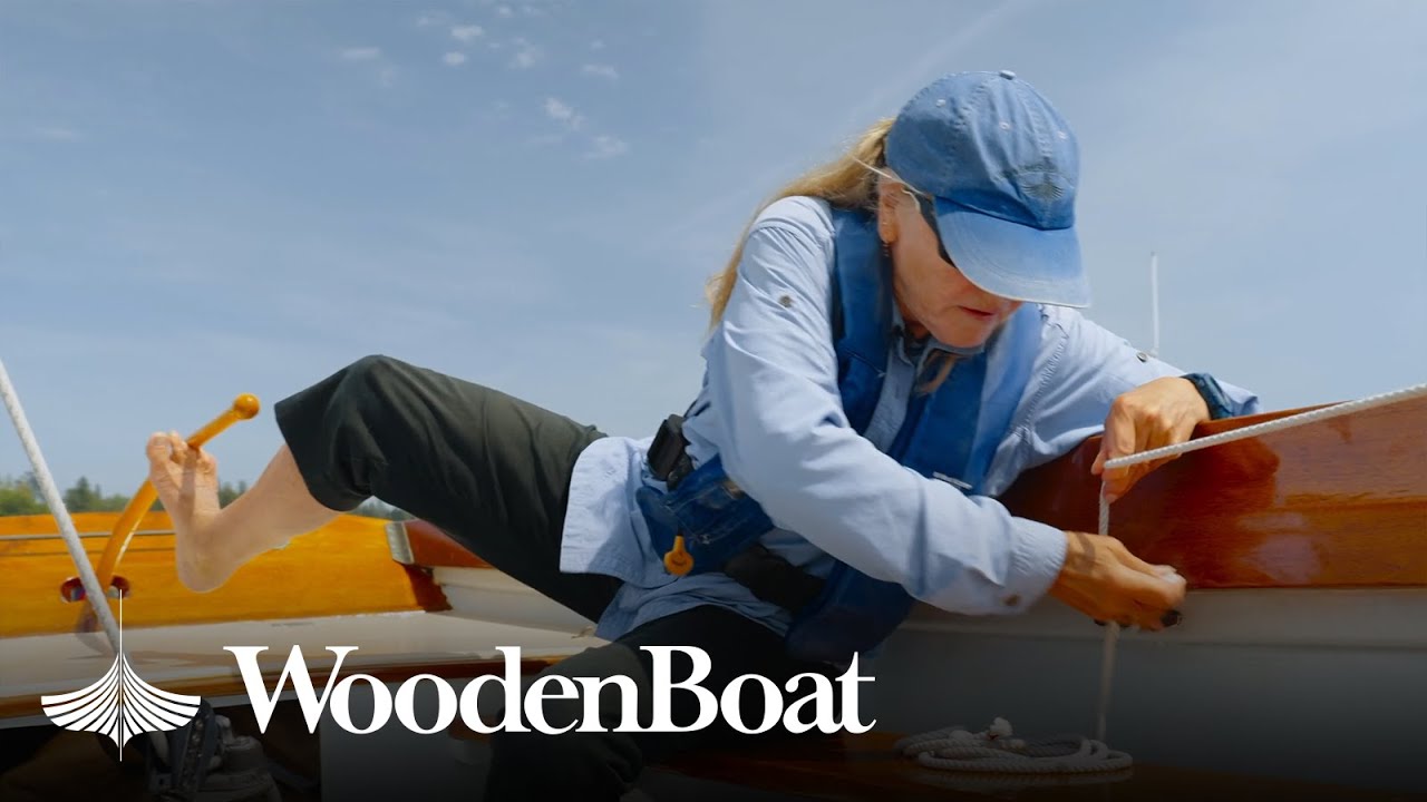 Demonstrating Basic Sailing Techniques in a Beautiful Daysailer