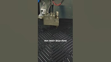 Glue dispenser draws hot melt adhesive dots