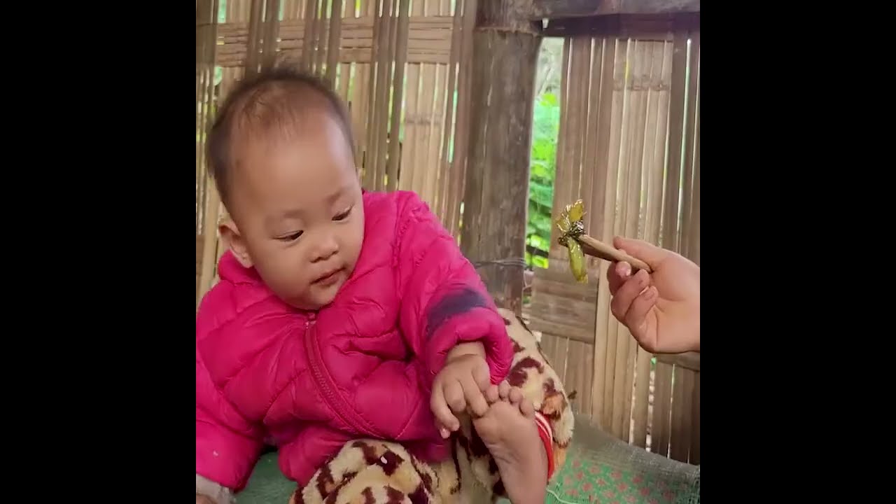 Single Mother with Baby Making Simple Bamboo Tables and Seats at Home