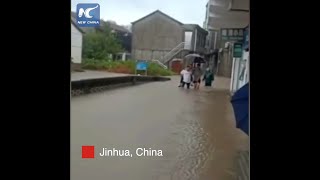 Elderly man narrowly escapes building collapse amid typhoon-triggered floods