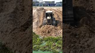 Amazing Action Old Heavy Dozer Pushing Dirt Filling Land With Truck Unloading