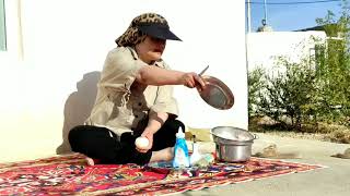 Cooking food on fire: cooking rice and chicken on fire in a rural style