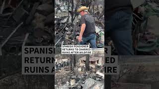 Spanish pensioner returns to charred ruins after wildfire | AFP