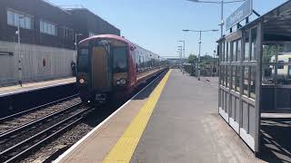 Class 387 slowly passing Three Bridges during a heatwave.