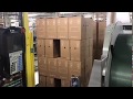 Trolly unloading box filling and palletising createch 2019