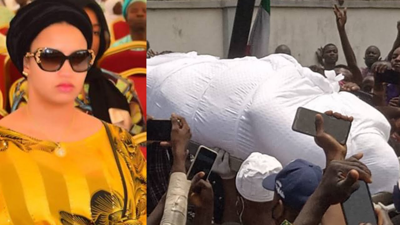 BURUJI KASHAMU'S WIFE BREAKS DOWN IN TEARS AS SHE SEES HER HUSBAND CORPSE