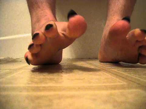 showing off Long Black Toenails