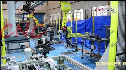 Turnkey Solution for Gantry with Inverted Mounted Robots for Machine Tending Application