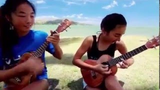 Two Girls Nailing The Guitar @ Beach