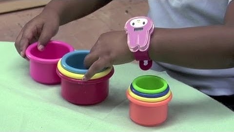 Seriating Objects by Length and Capacity with Child 20 (Early Math Collaborative at Erikson)