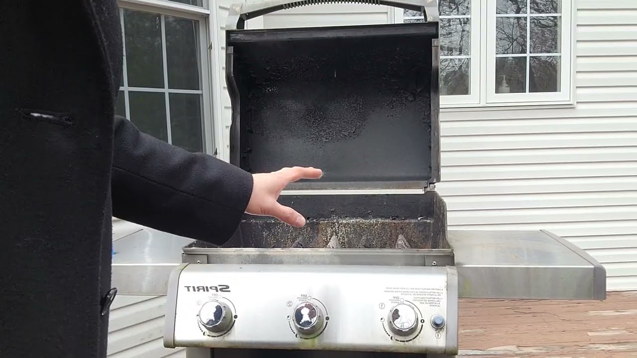 gas grill kashering process with grates removed and burners on high