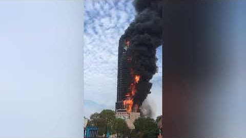 In China, the China-telecom skyscraper burned down in 20 minutes. Video.