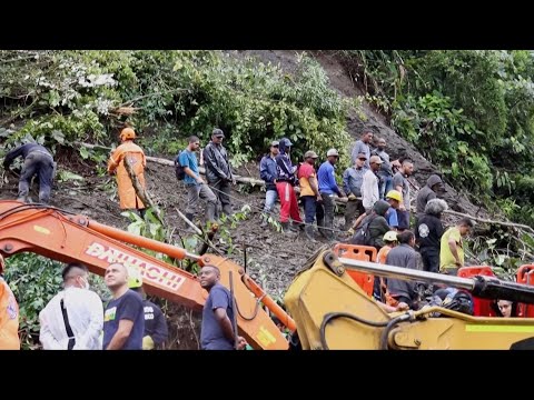 Rescuers comb scene of deadly landslide in colombia