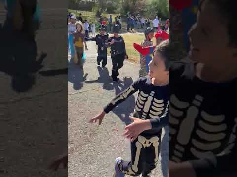 Halloween parade in Shloks school (Overland Trail Elementary School), KANSAS. SHLOK as a police