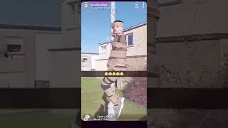 junkie tied to a lamppost