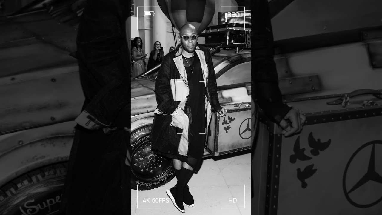 Yasiin Bey f.k.a. Mos Def is outside at Paris Fashion Week 