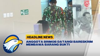 Anggota Brimob Datangi Bareskrim Membawa Barang Bukti