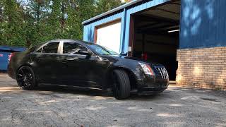 2011 Cadillac cts sitting on black 22" lexani pegasus wheels wrapped in 235/30-22 Lexani tires
