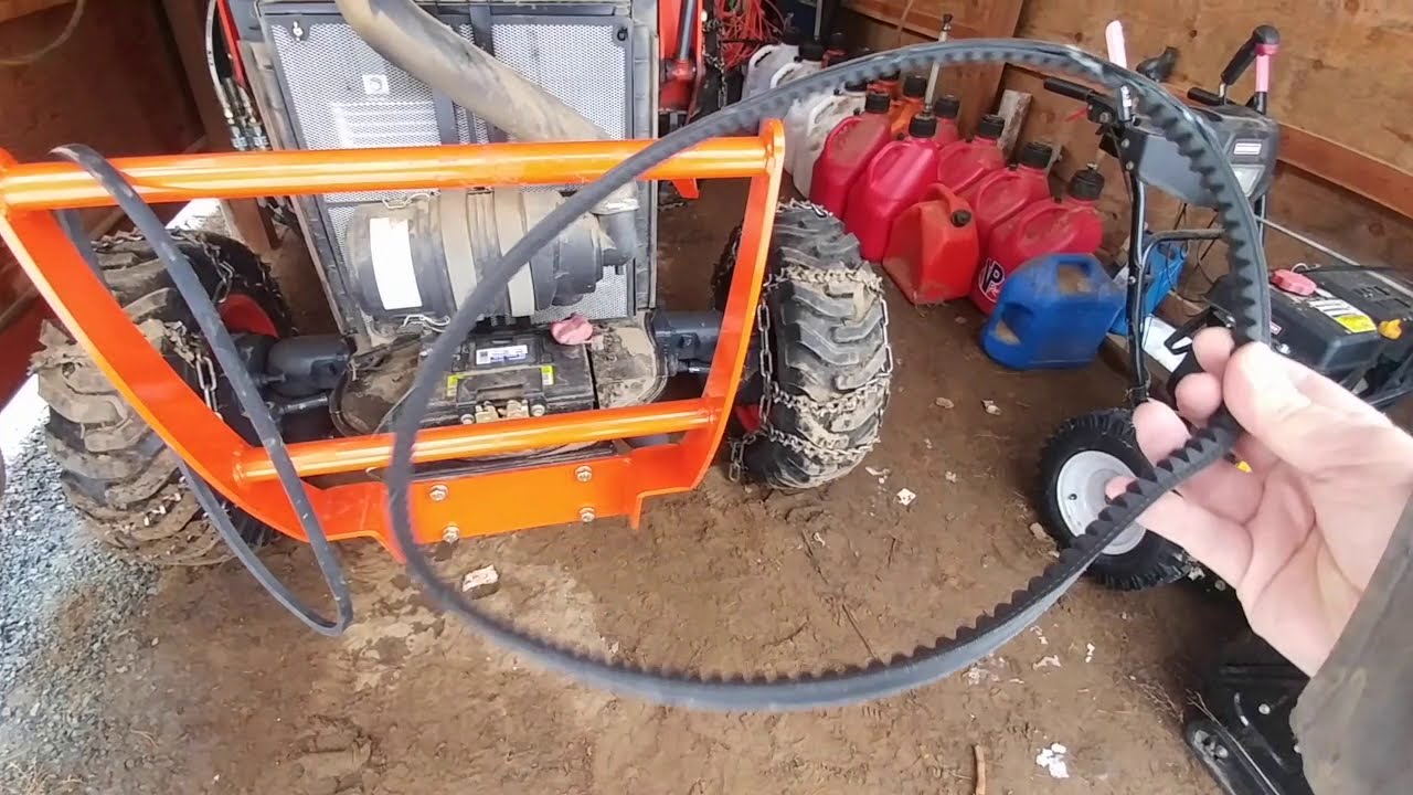Replace a tractor belt the easy way. YouTube