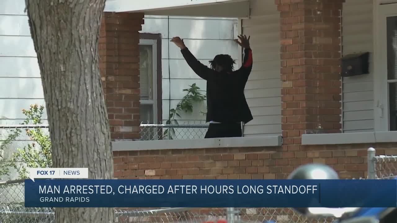 Man arrested, charged after hours-long standoff - YouTube