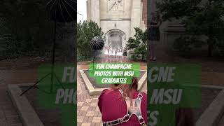 Spring Graduation Photos at Michigan State University in East Lansing - champagne spray #msu