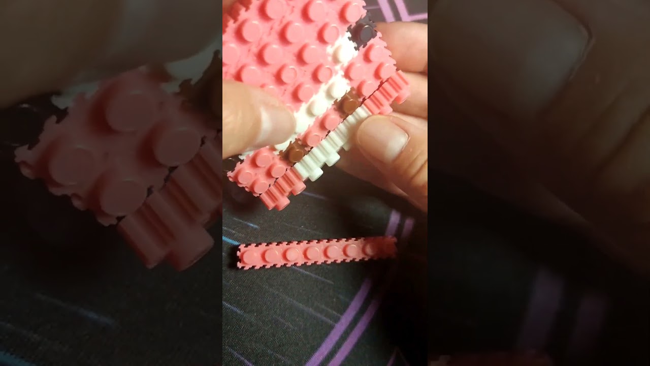 2D Minecraft pig figure, made with pixel blocks 