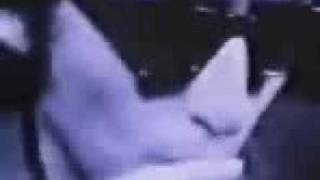 Bob Dylan shares a cigarette with Andy Warhol