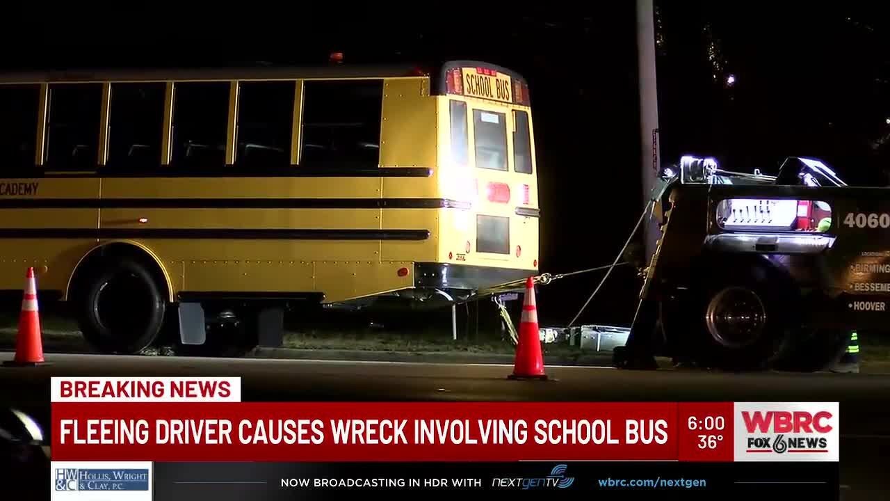 Fleeing driver causes wreck involving school bus