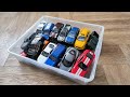 Box Filled With Random Toy Cars By Different Famous Car Brands