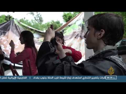 متطوعون يصنعون نظم طاقة شمسية من النفايات