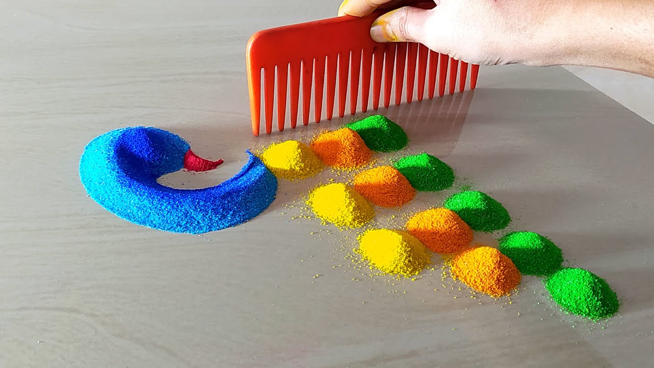 Happy diwali peacock rangoli design using COMB | Easy diya rangoli ...