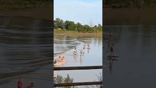 Surfing the mascaret on the Dordogne River France. Hydrofoil vs Stand up paddle board.