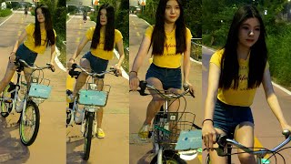 With A Pretty Model, Riding A Bike...