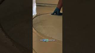 This worker spreads the liquid material on the floor surface#shorts #construction #shortvideo #fypシ