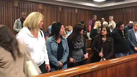 Coutts watches as Christopher Panayiotou is taken ...