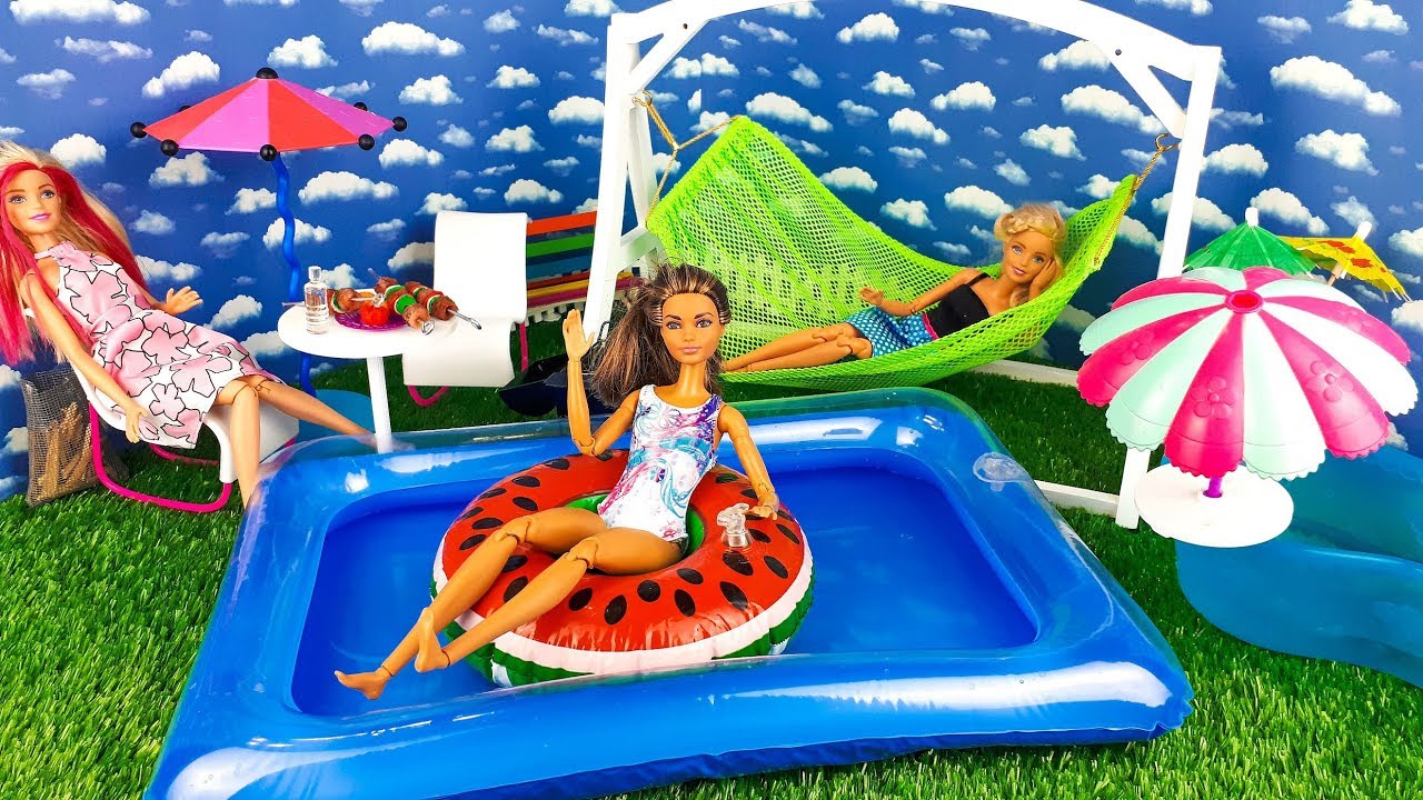 barbie doll in swimming pool