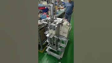 Automatic hook and loop tape cutting machine with stacker
