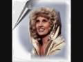 Tammy Wynette singing "Honey i miss you"