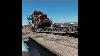 SCISSOR NECK LOADING ALBERTA TRUCKING