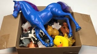 Box of Toys Full of Farm Animals to Learn Colors for Kids