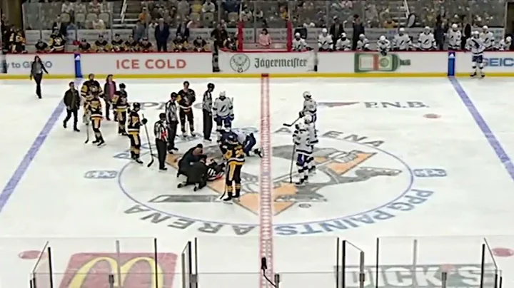 NHL Referee Steve Kozari in mid-ice collision