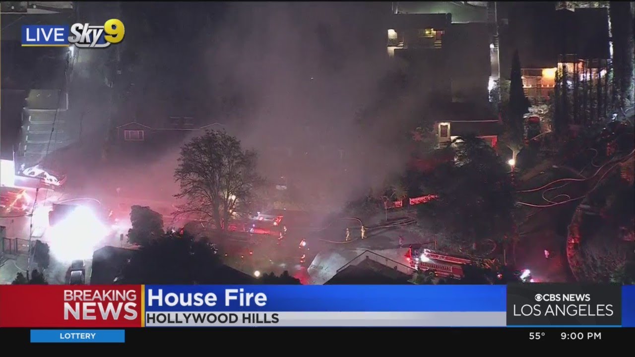 Fire Crews Work To Extinguish Blaze At Hollywood Hills Home - YouTube